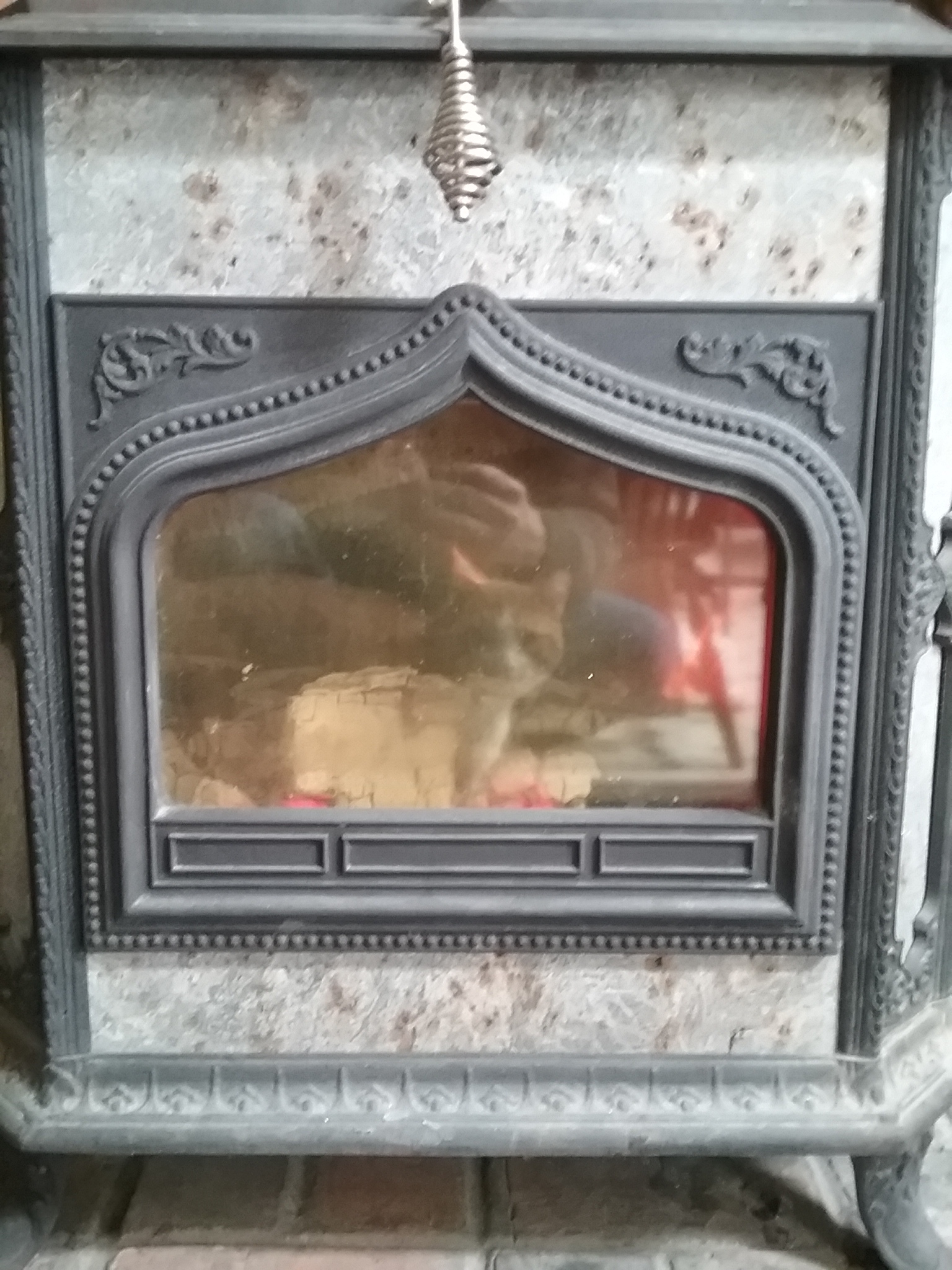 Wood-Stove Reflection: Mimou